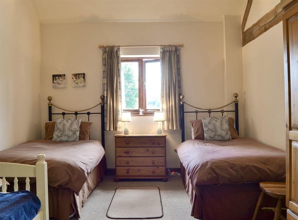 Spacious twin bedroom at Skimblescott Barn in Much Wenlock, Shropshire., Great Britain