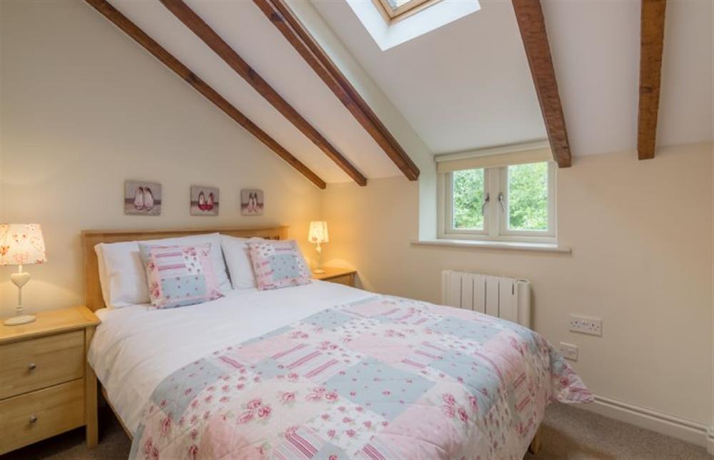 First floor: Bedroom two, double bed at Skimming Stones, North Creake near Fakenham