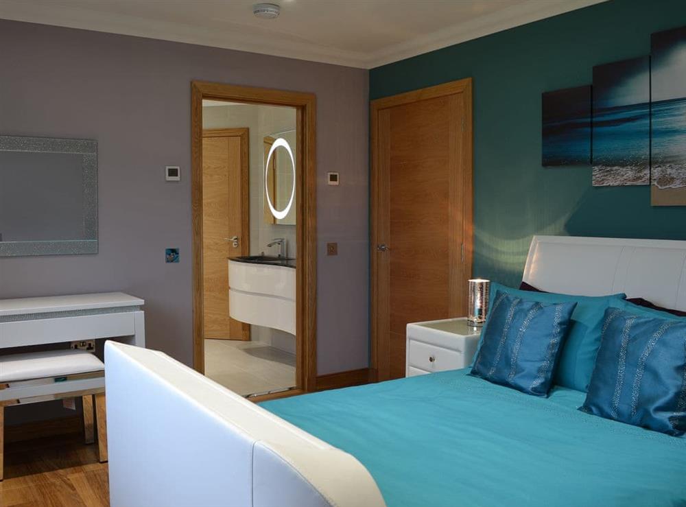 Double bedroom with en-suite bathroom at Skippers Retreat in Clachan Sands, Isle of North Uist, Scotland