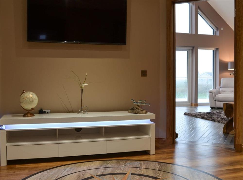 Hallway with 55 inch TV at Skippers Retreat in Clachan Sands, Isle of North Uist, Scotland