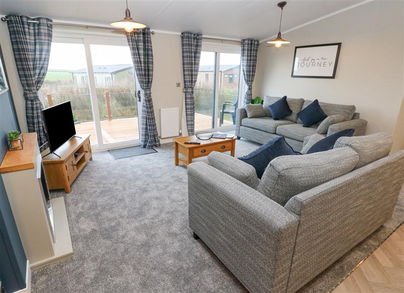 Relax in the living area at Skomer Lodge, Hasguard Cross near Broad Haven
