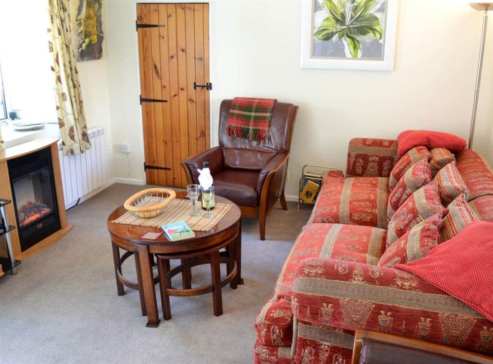 Cosy lounge area at Skyber Cottage in Ruan Minor, near Helston, Cornwall