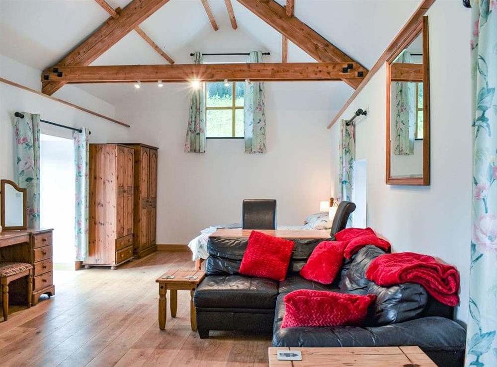 Open plan living space at Slade Cottage in Brayford, Devon