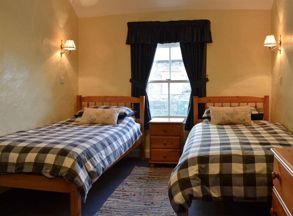 Twin bedroom at Slate Cottage in Keswick, Cumbria