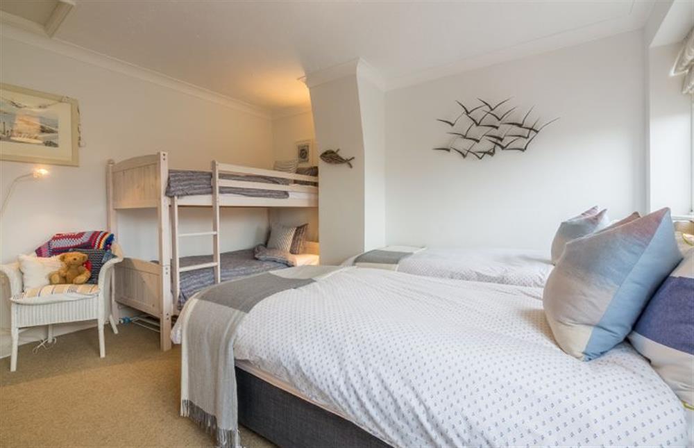 First floor:  Bedroom two has twin beds and bunk bed (photo 2) at Sleepy Gull, Old Hunstanton