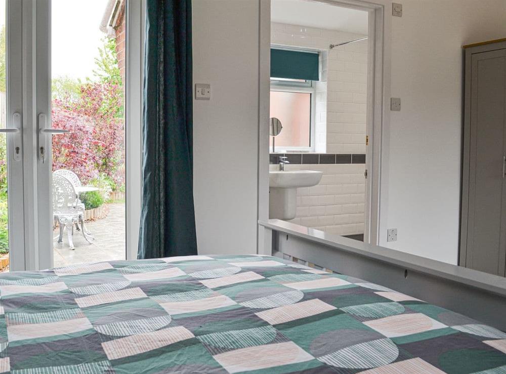 Double bedroom with en-suite at Sleepy Willow in Little Snoring, near Fakenham, Norfolk