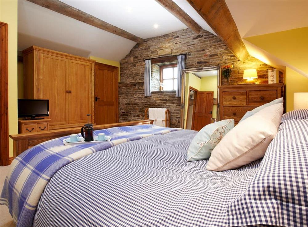 Comfortable bedroom with kingsize bed (photo 2) at Birch Cottage, 
