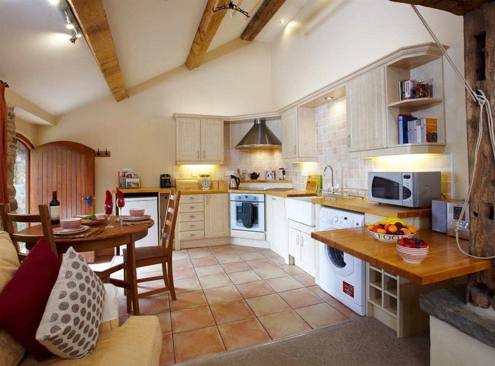 Open plan living space with beams (photo 3) at Bramble Cottage, 