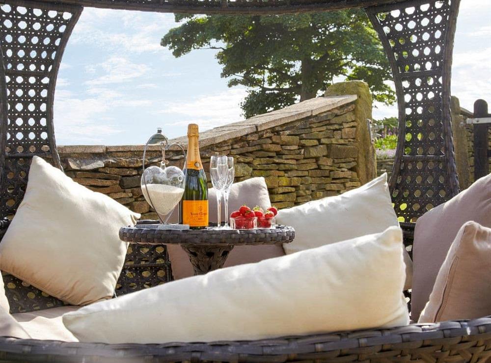 Shared patio with garden furniture at The Farmhouse, 