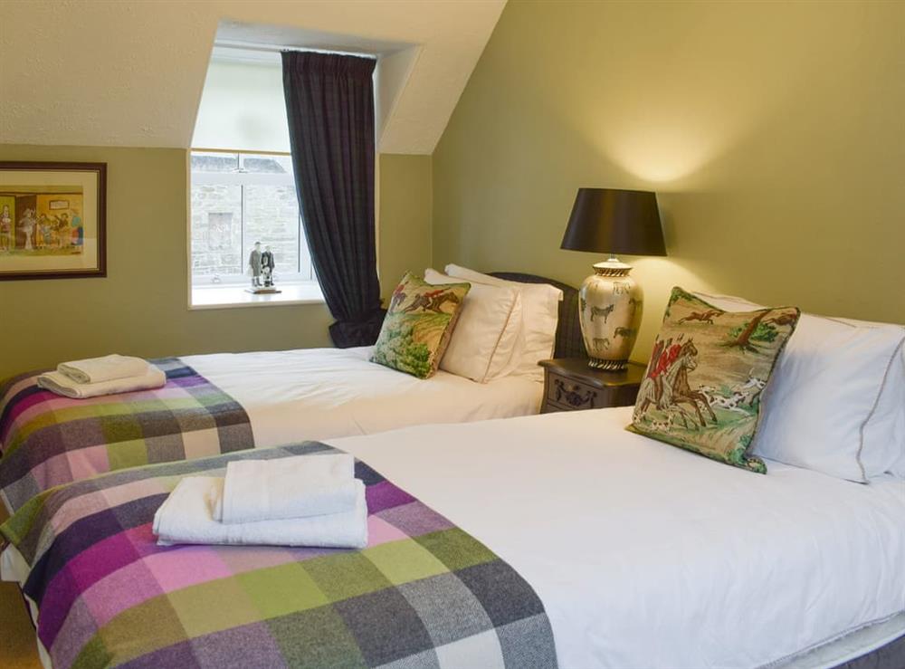 Good sized twin bedroom at Smiddy Cottage in Weem, near Aberfeldy, Perthshire