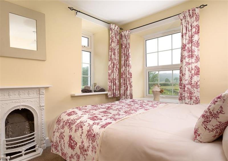 A bedroom in Smithy Cottage at Bowland Bridge at Smithy Cottage at Bowland Bridge, Bowness
