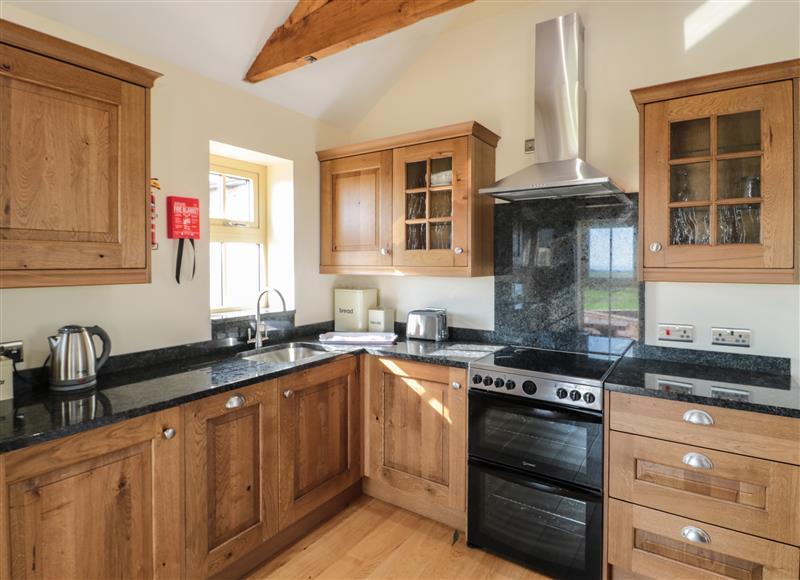 This is the kitchen (photo 2) at Smithy Cottage, Embleton