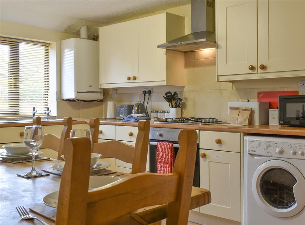 Kitchen/diner at Smithy Cottage in Farndon, near Chester, Cheshire