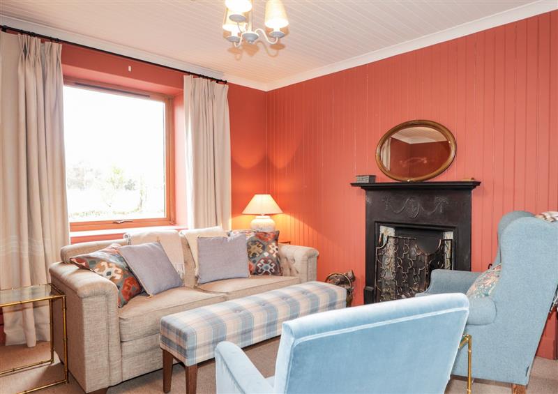 Relax in the living area at Smithy Cottage, Kinlochewe