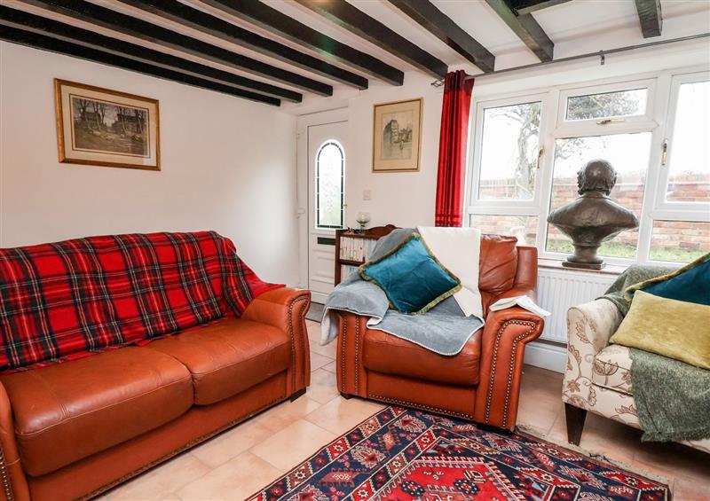 Relax in the living area at Smithy Cottage, Llan-y-Pwll near Wrexham