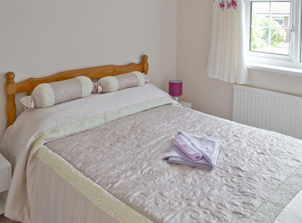 Comfortable double bedroom at Smitten Cottage in Rhyl, Denbighshire