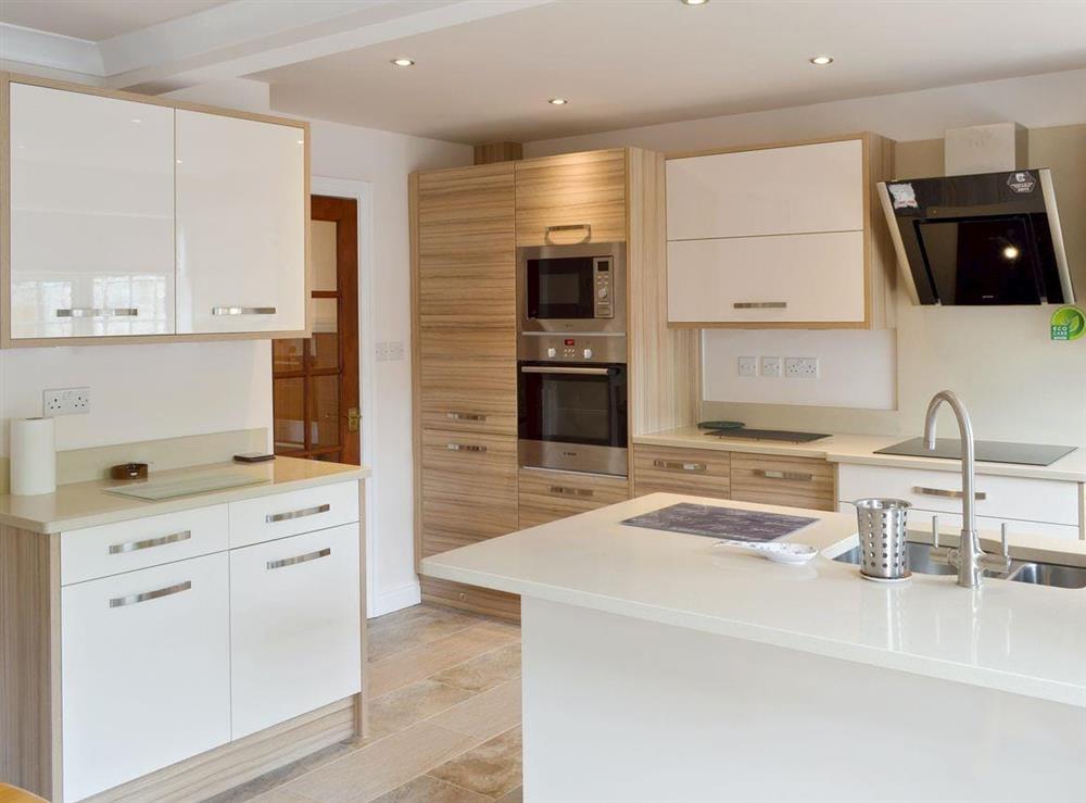 Comprehensively appointed contemporary kitchen at Smitten Cottage in Rhyl, Denbighshire