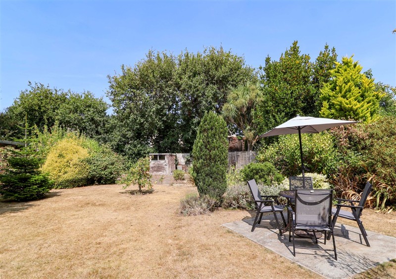 Enjoy the garden at Smugglers Cottage, Barton On Sea