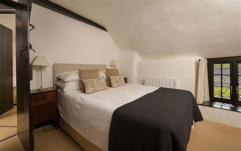 The attractive first floor double bedroom at Smugglers End in Hope Cove