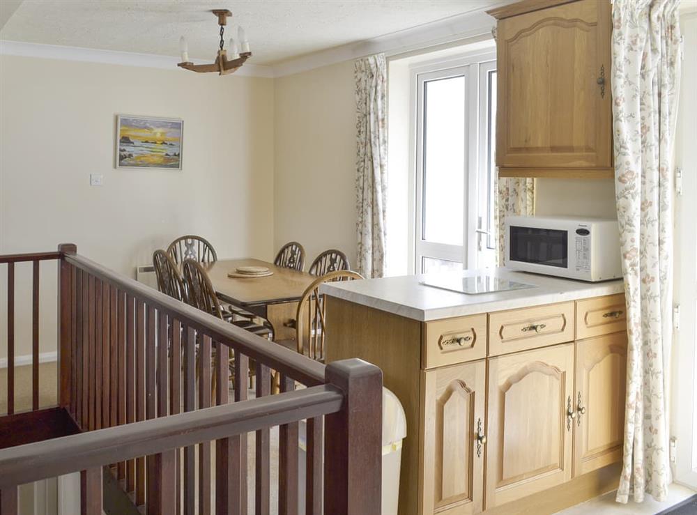 Open-plan living area includes dining and kitchen spaces at Smugglers Haunt in Hope Cove, Devon