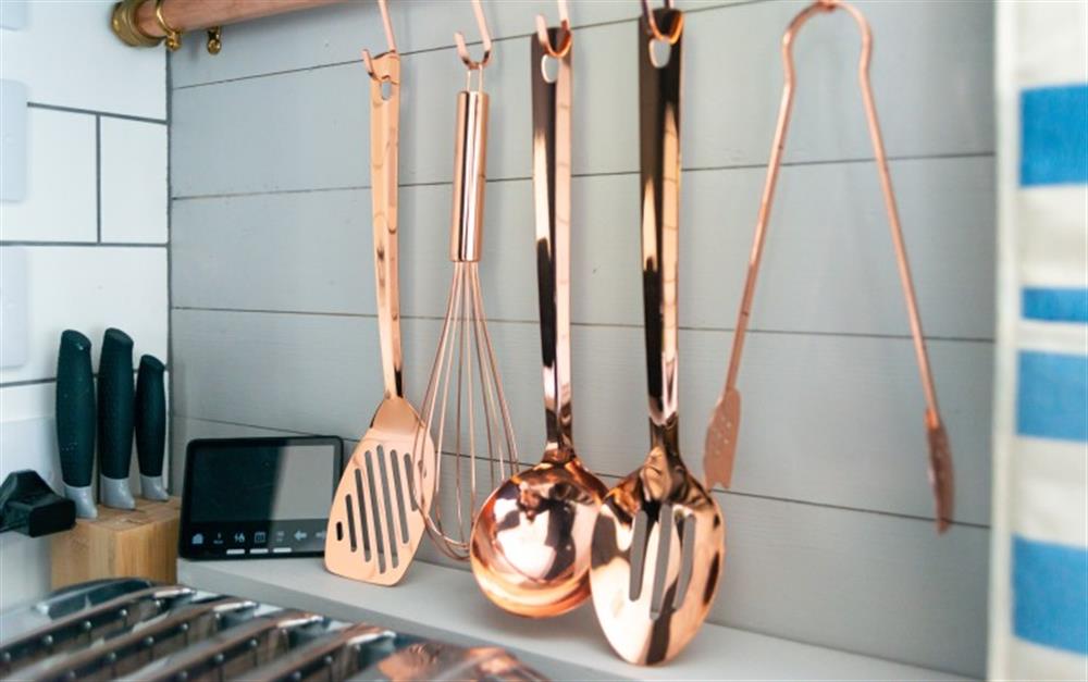 A good selection of cooking utensils matches perfectly. at Smugglers in Helford Passage