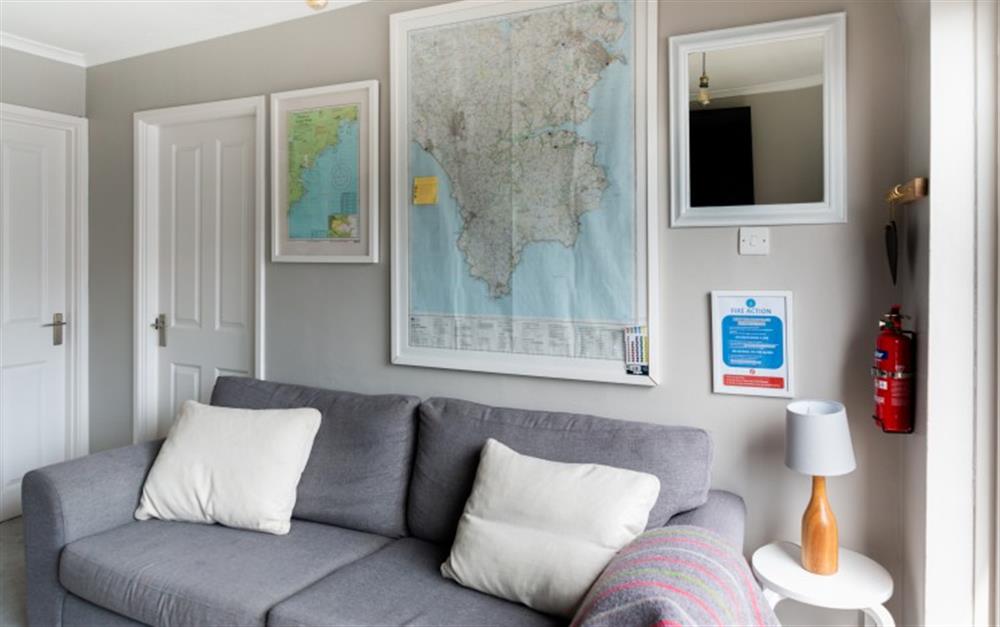 The comfy sofa is ideal for putting your feet up and relaxing at Smugglers in Helford Passage