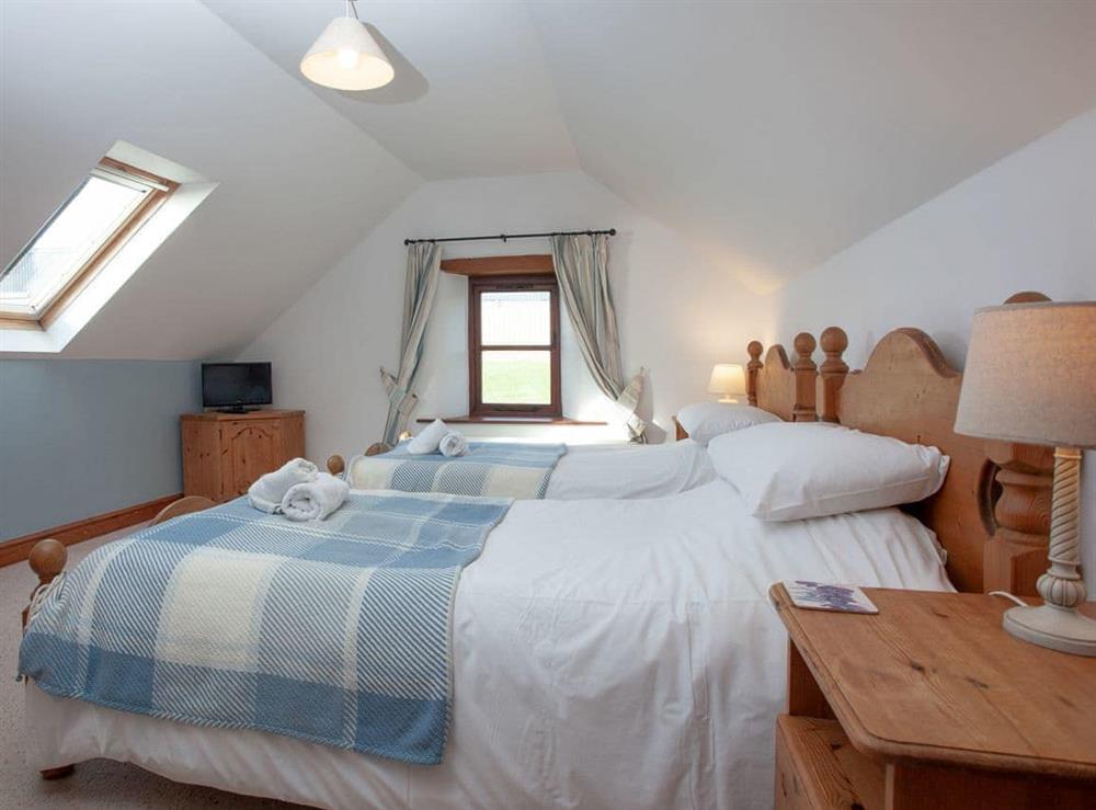 Twin bedroom at Smuggler’s Retreat in Hartland Point, Devon