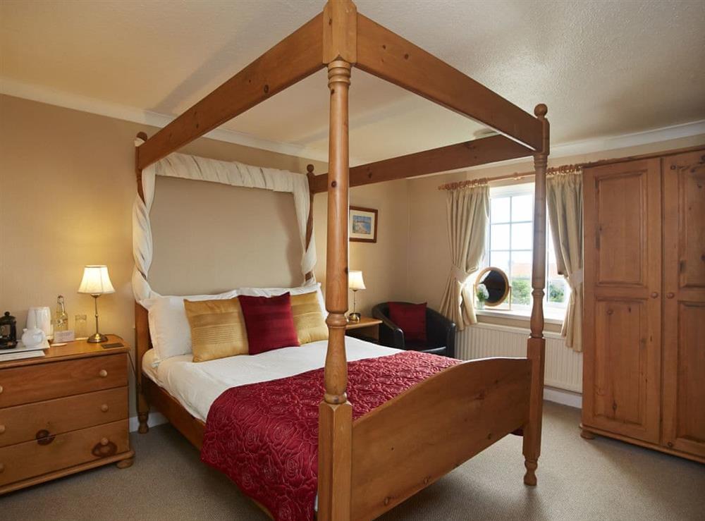 Four Poster bedroom at Smugglers Rock House in Ravenscar near Scarborough, North Yorkshire