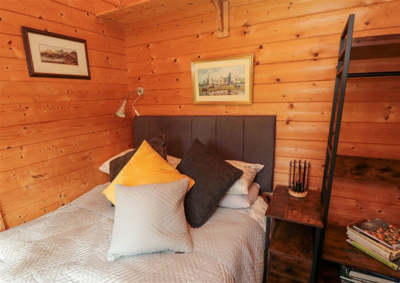 This is the bedroom at Snape Castle Garden Lodge, Snape near Bedale