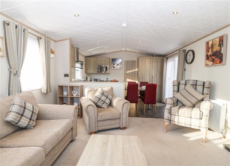 Relax in the living area at Snape Lodge, Towyn