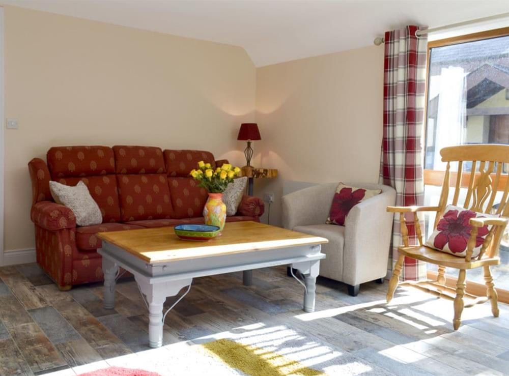 Comfortable living area at Snipelands Barn in Wedmore, near Glastonbury, Somerset