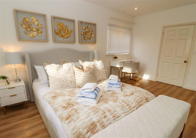 This is a bedroom at Snowdrop, Blandford Forum