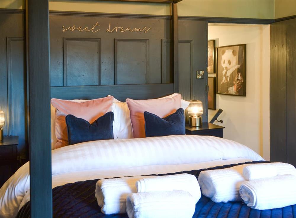 Four Poster bedroom at Snowdrop Cottage in Welburn, near York, North Yorkshire