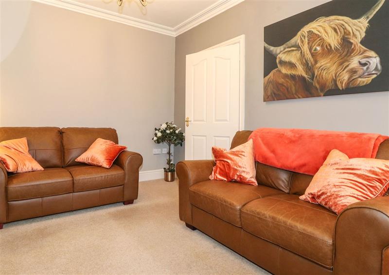 Relax in the living area at Snowflake Cottage, Windermere