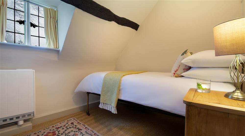 The single bedroom at Snowshill Honor's Cottage in Broadway, Gloucestershire