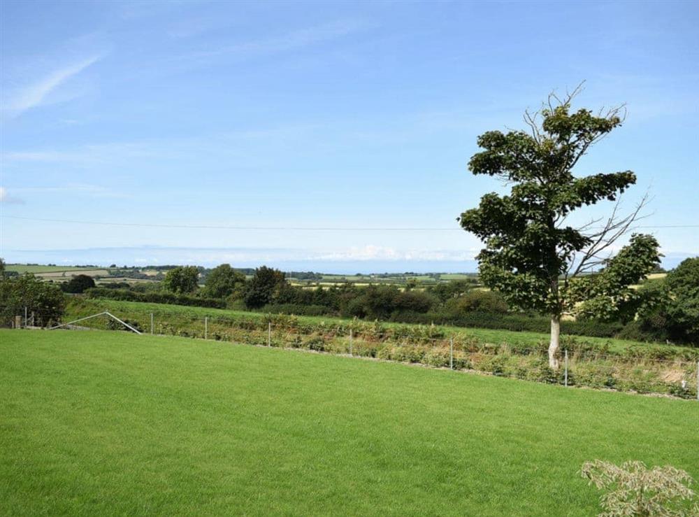 Large lawned garden with stunning views at Soar Cottage in Dihewyd, near Aberaeron, Ceredigion, Dyfed