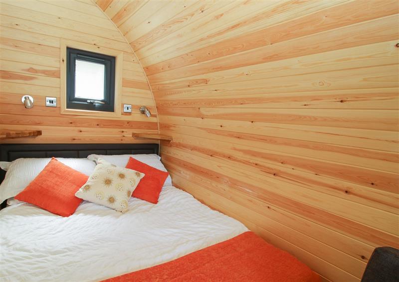 A bedroom in Sol Holiday Pod at Sol Holiday Pod, Snailbeach near Minsterley