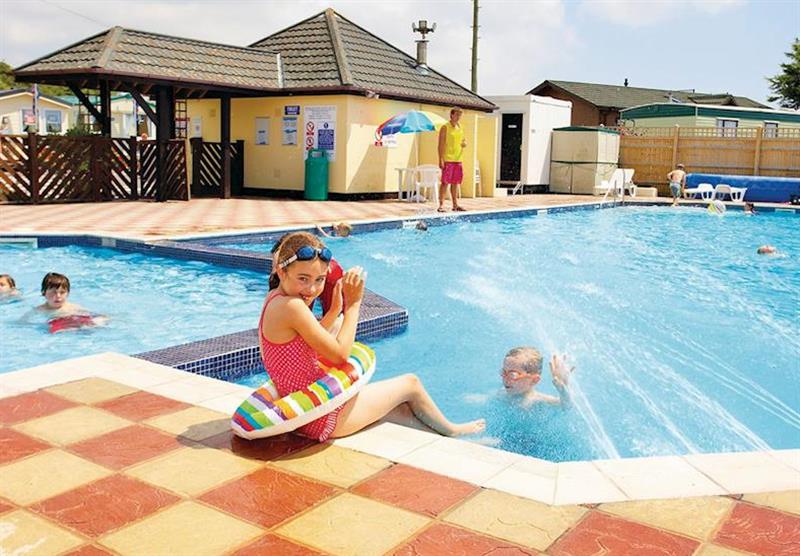 Outdoor heated swimming pool at Solent Breezes in Fareham, Hampshire