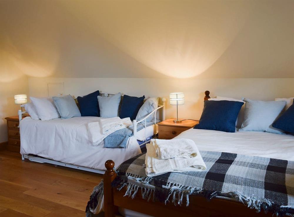 Bedroom with kingsize bed and day bed (photo 2) at Solitude in Aberhafesp, near Newtown, Powys