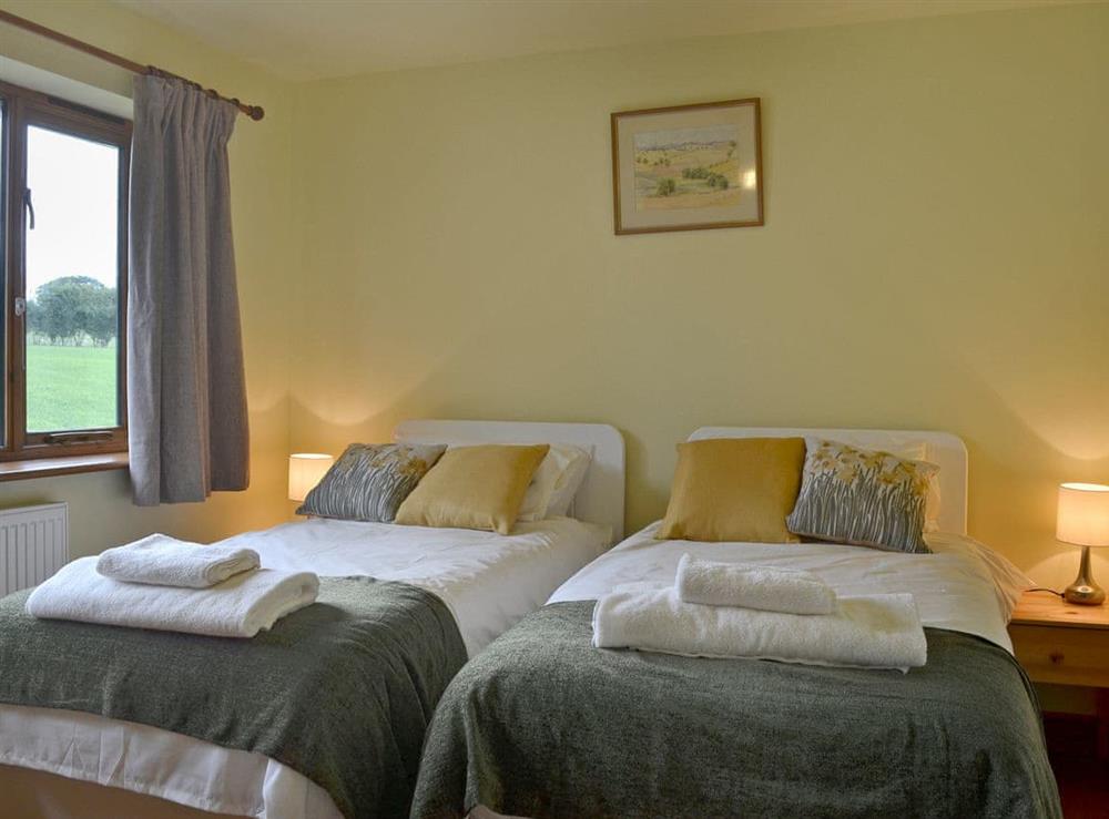 Comfortable twin bedroom at Solitude in Aberhafesp, near Newtown, Powys