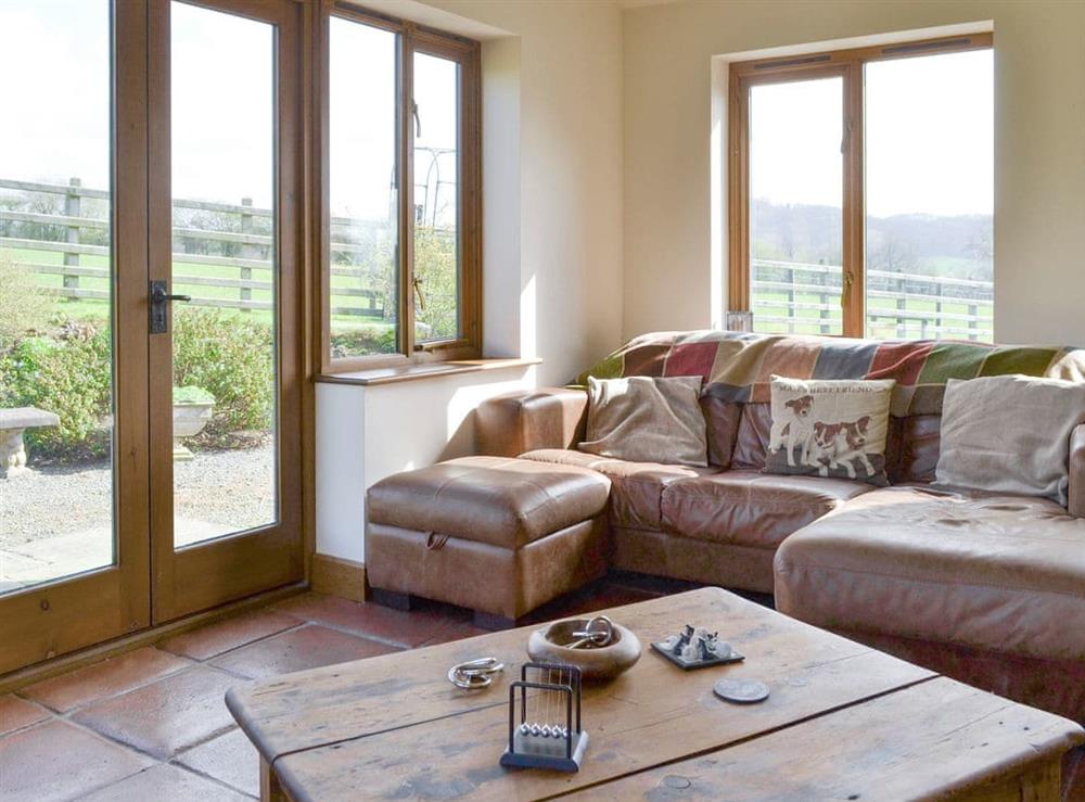 Welcoming sunroom/living room at Solitude in Aberhafesp, near Newtown, Powys