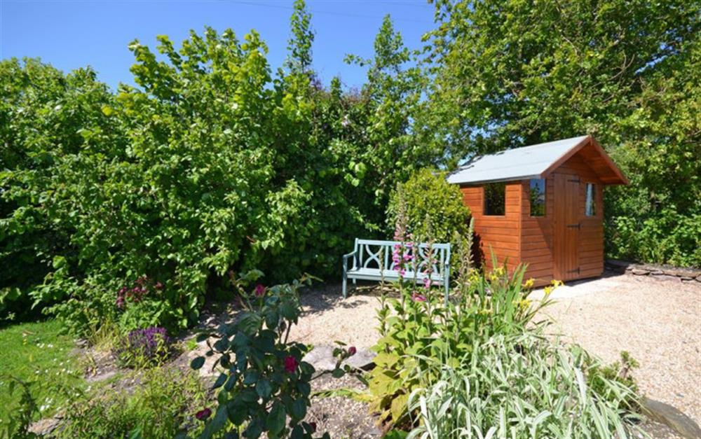 Another view of the garden and its summer cabin. at Solstice in Blackawton