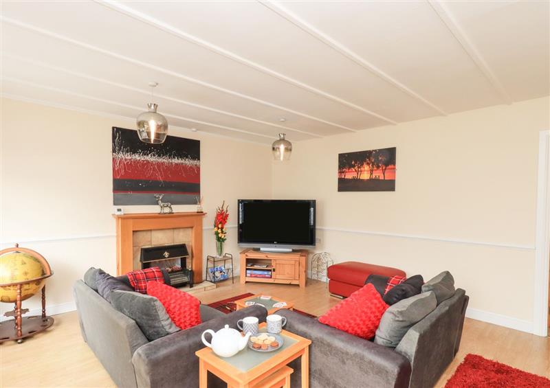 Relax in the living area at Solway Cottage, Powfoot near Annan