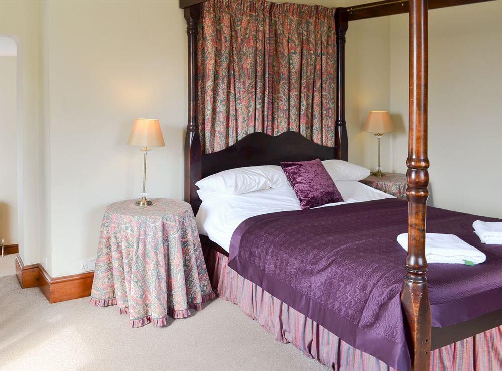 Four Poster bedroom at Somersal Farmhouse in Somersal Herbert, Ashbourne, Derbyshire
