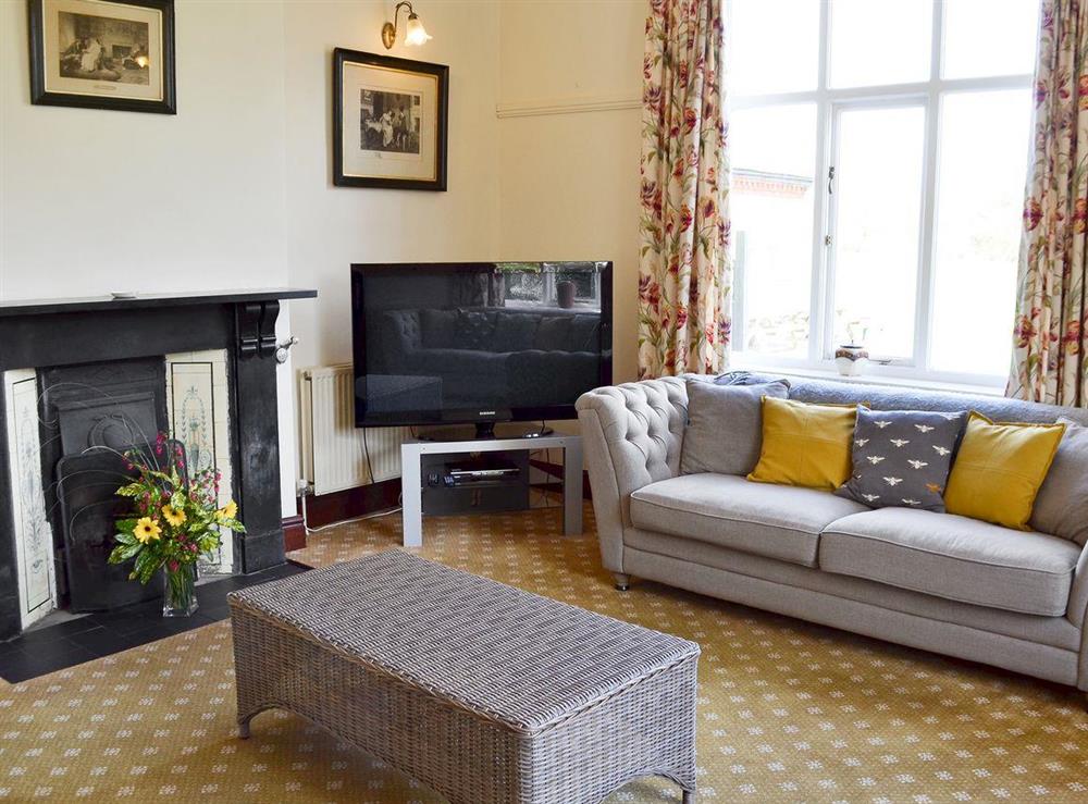 Spacious living room at Somersal Farmhouse in Somersal Herbert, Ashbourne, Derbyshire