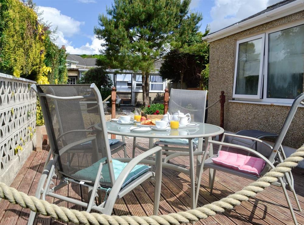 Outdoor dining area at Sonny Cottage in Garnant, near Ammanford, Carmarthenshire, Dyfed