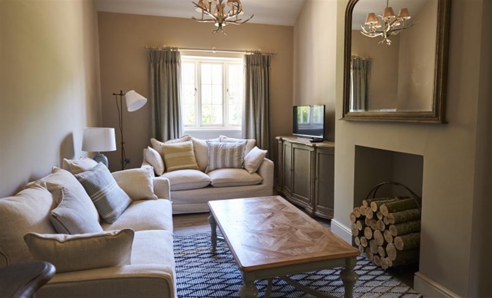 Relax in the living area at Sopley Cottages in Sopley