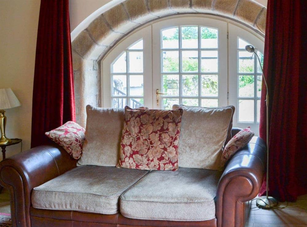 Elegant and comfortable living room at Cobweb Cottage, 