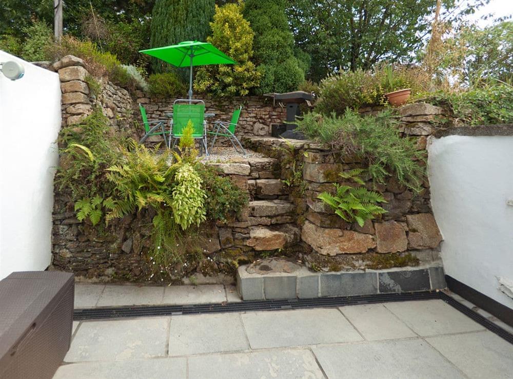 Terraced patio area to rear of the holiday home at Sorgente in Falmouth, Cornwall