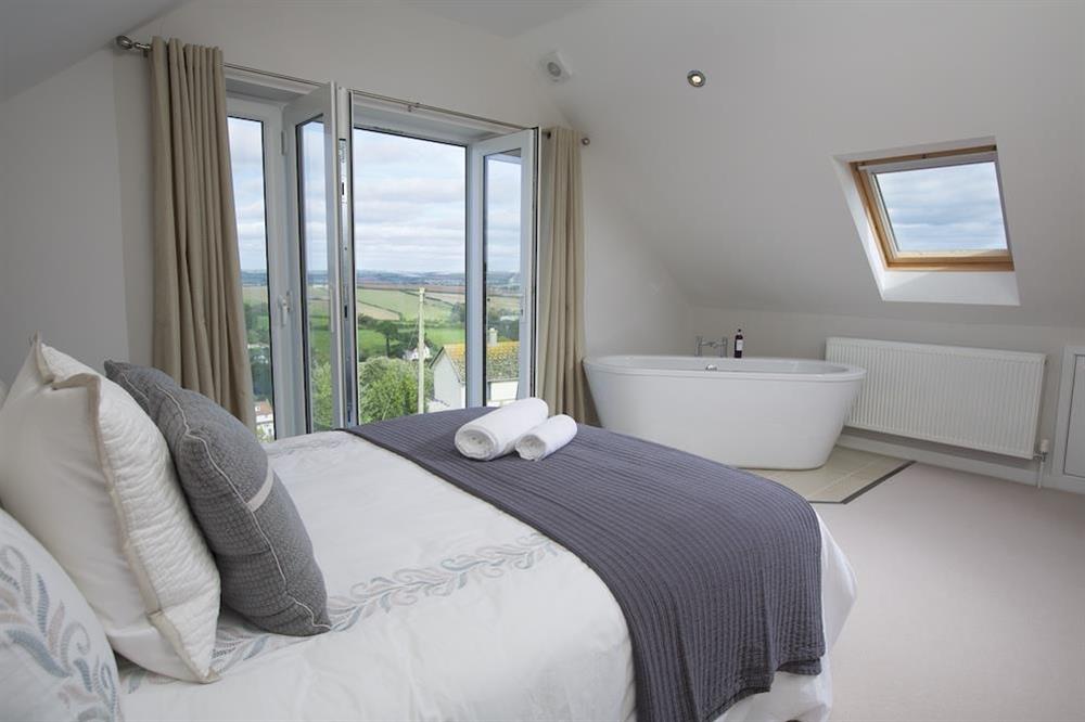 En suite master bedroom with panoramic views at Soundings in , Salcombe